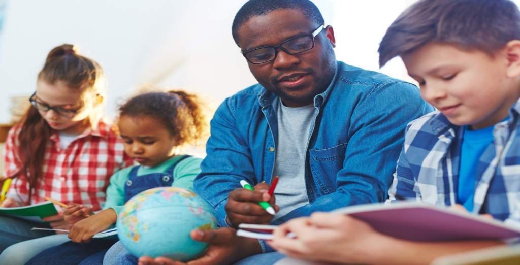 a teacher teaching students in an affordable after school program 