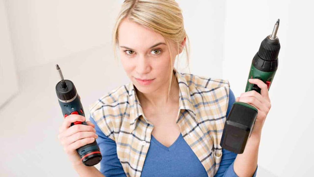 woman with power tools to make home repairs